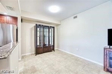 Welcome to your dream condo in the prestigious Colonial Country on Colonial Country Club in Florida - for sale on GolfHomes.com, golf home, golf lot