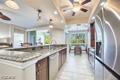 Welcome to your dream condo in the prestigious Colonial Country on Colonial Country Club in Florida - for sale on GolfHomes.com, golf home, golf lot