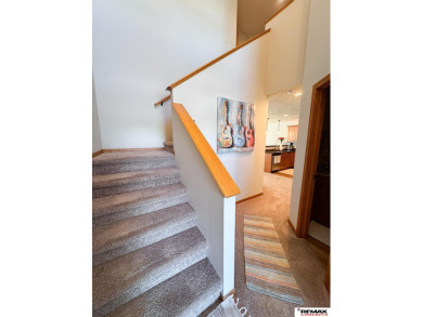 This home is sure to impress! Welcome to this 4-bedroom, 3 on Mahoney Golf Course in Nebraska - for sale on GolfHomes.com, golf home, golf lot