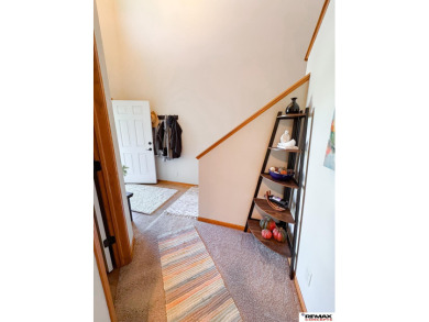 This home is sure to impress! Welcome to this 4-bedroom, 3 on Mahoney Golf Course in Nebraska - for sale on GolfHomes.com, golf home, golf lot
