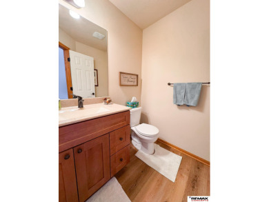 This home is sure to impress! Welcome to this 4-bedroom, 3 on Mahoney Golf Course in Nebraska - for sale on GolfHomes.com, golf home, golf lot