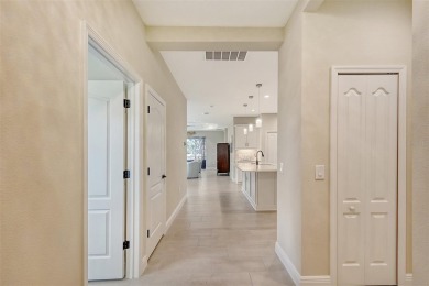 This beautifully decorated Boca Royale Sandcastle model features on Boca Royale Golf and Country Club in Florida - for sale on GolfHomes.com, golf home, golf lot