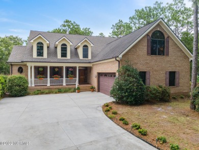 This beautiful custom built home offers expansive golf course on Members Club At St. James Plantation in North Carolina - for sale on GolfHomes.com, golf home, golf lot