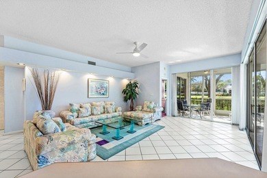 Inviting sun-splashed ground-floor condo with lovely golf and on Polo Club of Boca Raton in Florida - for sale on GolfHomes.com, golf home, golf lot