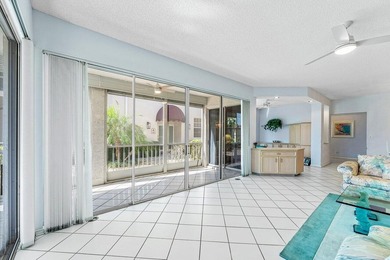 Inviting sun-splashed ground-floor condo with lovely golf and on Polo Club of Boca Raton in Florida - for sale on GolfHomes.com, golf home, golf lot