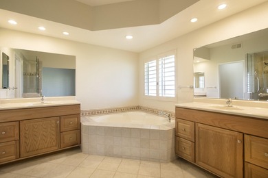 Perfectly positioned with double fairway and panoramic mountain on Desert Falls Country Club in California - for sale on GolfHomes.com, golf home, golf lot