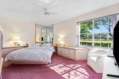 Inviting sun-splashed ground-floor condo with lovely golf and on Polo Club of Boca Raton in Florida - for sale on GolfHomes.com, golf home, golf lot