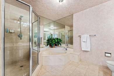 Inviting sun-splashed ground-floor condo with lovely golf and on Polo Club of Boca Raton in Florida - for sale on GolfHomes.com, golf home, golf lot