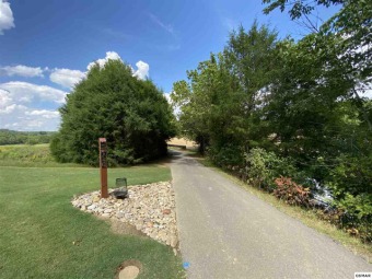 CONVENIENT AND BREATHTAKING ESTATE SIZE LOT ON SEVIERVILLE GOLF on Sevierville Golf Club in Tennessee - for sale on GolfHomes.com, golf home, golf lot