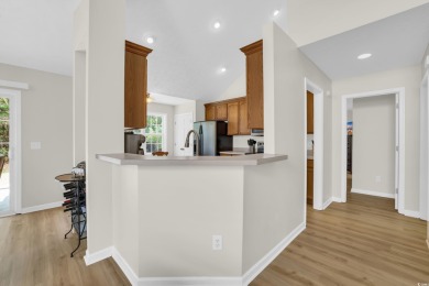 This charming 3 bed/2 bath home with a loft/bonus room is on TPC Myrtle Beach Golf Club in South Carolina - for sale on GolfHomes.com, golf home, golf lot