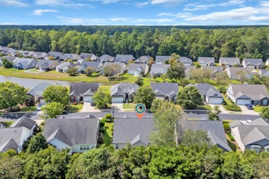 This charming 3 bed/2 bath home with a loft/bonus room is on TPC Myrtle Beach Golf Club in South Carolina - for sale on GolfHomes.com, golf home, golf lot