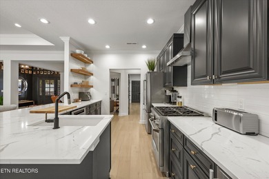 Discover a beautifully curated blend of timeless traditional on Tanasi Golf Course in Tennessee - for sale on GolfHomes.com, golf home, golf lot