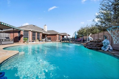 Welcome to this beautiful brick home nestled on an oversized on Mansfield National Golf Club in Texas - for sale on GolfHomes.com, golf home, golf lot