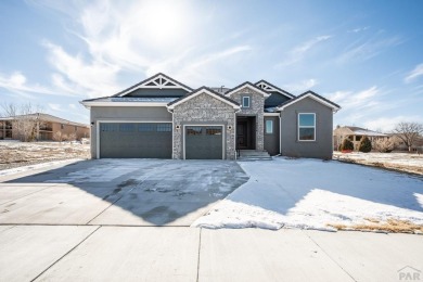 Experience unparalleled luxury in this custom-built home in The on Walking Stick Golf Course in Colorado - for sale on GolfHomes.com, golf home, golf lot