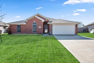 Welcome to this beautiful brick home nestled on an oversized on Mansfield National Golf Club in Texas - for sale on GolfHomes.com, golf home, golf lot