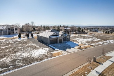 Experience unparalleled luxury in this custom-built home in The on Walking Stick Golf Course in Colorado - for sale on GolfHomes.com, golf home, golf lot