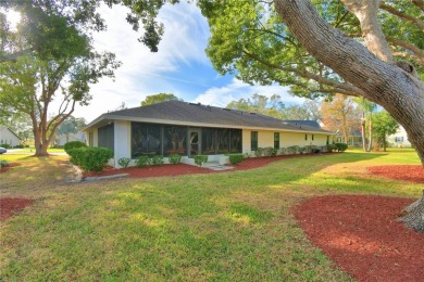 Discover this well-maintained 3-bedroom, 2.5-bath home on Cypresswood Golf and Country Club in Florida - for sale on GolfHomes.com, golf home, golf lot