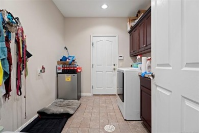 Beautiful 4-bed, 2 full & 2 half-bath home in a desirable gated on  in Oklahoma - for sale on GolfHomes.com, golf home, golf lot