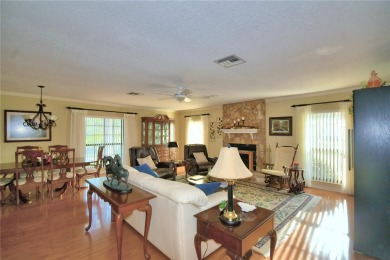 Discover this well-maintained 3-bedroom, 2.5-bath home on Cypresswood Golf and Country Club in Florida - for sale on GolfHomes.com, golf home, golf lot