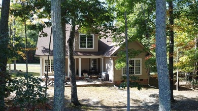 Charming 4BR/3BA brick home overlooking the signature 16th hole on Glade Springs Resort Golf Course in West Virginia - for sale on GolfHomes.com, golf home, golf lot