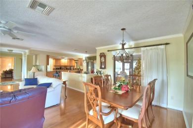 Discover this well-maintained 3-bedroom, 2.5-bath home on Cypresswood Golf and Country Club in Florida - for sale on GolfHomes.com, golf home, golf lot