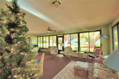 Discover this well-maintained 3-bedroom, 2.5-bath home on Cypresswood Golf and Country Club in Florida - for sale on GolfHomes.com, golf home, golf lot