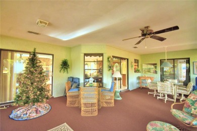 Discover this well-maintained 3-bedroom, 2.5-bath home on Cypresswood Golf and Country Club in Florida - for sale on GolfHomes.com, golf home, golf lot