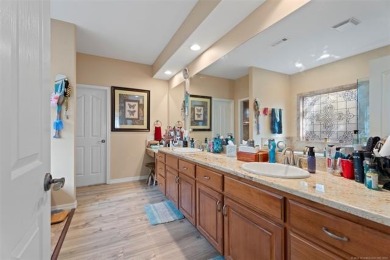 Beautiful 4-bed, 2 full & 2 half-bath home in a desirable gated on  in Oklahoma - for sale on GolfHomes.com, golf home, golf lot