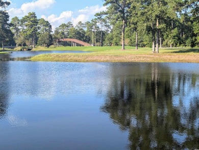 Imagine enjoying peaceful water views all day from this on River Oaks Golf Plantation  in South Carolina - for sale on GolfHomes.com, golf home, golf lot