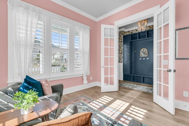 Step inside this impressive three-story residence in the on Dunes West Golf Club in South Carolina - for sale on GolfHomes.com, golf home, golf lot