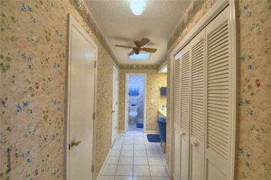 Discover this well-maintained 3-bedroom, 2.5-bath home on Cypresswood Golf and Country Club in Florida - for sale on GolfHomes.com, golf home, golf lot