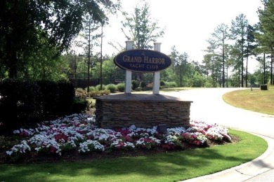 REDUCED!! Best of both worlds! This gently sloping Grand Harbor on The Patriot Golf Club At Grand Harbor in South Carolina - for sale on GolfHomes.com, golf home, golf lot