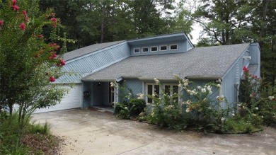 This 3 bed, 2 bath single-story home sits on the smaller fishing on Fairfield Plantation Golf and Country Club in Georgia - for sale on GolfHomes.com, golf home, golf lot