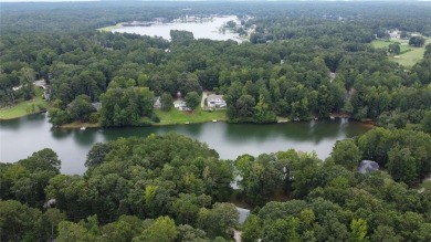 This 3 bed, 2 bath single-story home sits on the smaller fishing on Fairfield Plantation Golf and Country Club in Georgia - for sale on GolfHomes.com, golf home, golf lot