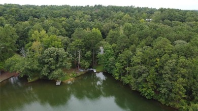 This 3 bed, 2 bath single-story home sits on the smaller fishing on Fairfield Plantation Golf and Country Club in Georgia - for sale on GolfHomes.com, golf home, golf lot