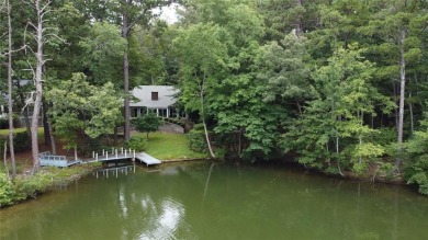 This 3 bed, 2 bath single-story home sits on the smaller fishing on Fairfield Plantation Golf and Country Club in Georgia - for sale on GolfHomes.com, golf home, golf lot