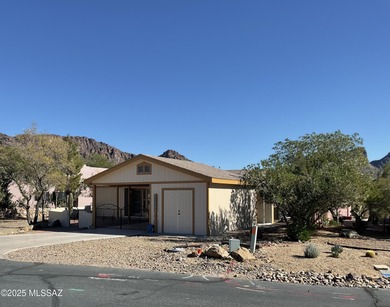 A lovely, well-cared for home located in the desirable Tucson on Tucson Estates Golf Course in Arizona - for sale on GolfHomes.com, golf home, golf lot