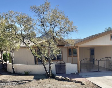 A lovely, well-cared for home located in the desirable Tucson on Tucson Estates Golf Course in Arizona - for sale on GolfHomes.com, golf home, golf lot
