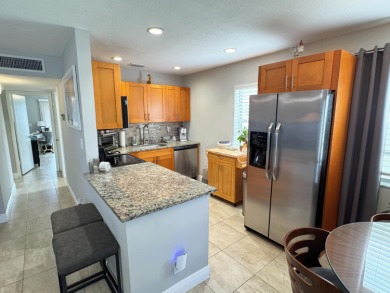 CALLING ALL INVESTORS! TENANT OCCUPIED, UPDATED 2/2 UNIT - NO on Kings Point Golf -Flanders Way in Florida - for sale on GolfHomes.com, golf home, golf lot