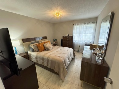 CALLING ALL INVESTORS! TENANT OCCUPIED, UPDATED 2/2 UNIT - NO on Kings Point Golf -Flanders Way in Florida - for sale on GolfHomes.com, golf home, golf lot