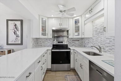 Looking for laid-back beach living? Don't miss this tastefully on Ocean Palm Golf Course in Florida - for sale on GolfHomes.com, golf home, golf lot