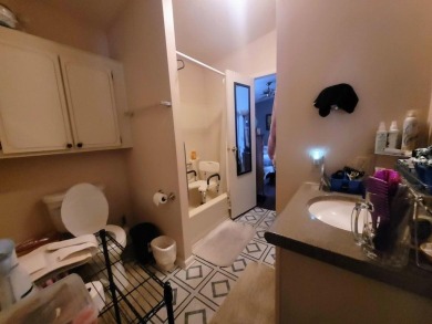 This manufactured home has a carport and a golf cart garage with on Orange Blossom Hills Golf and Country Club in Florida - for sale on GolfHomes.com, golf home, golf lot