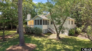 Welcome to 48 Ginguite Trail, a charming one-level ranch-style on Duck Woods Country Club in North Carolina - for sale on GolfHomes.com, golf home, golf lot
