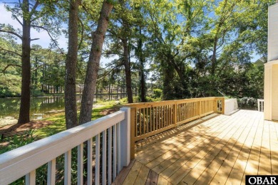 Welcome to 48 Ginguite Trail, a charming one-level ranch-style on Duck Woods Country Club in North Carolina - for sale on GolfHomes.com, golf home, golf lot