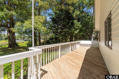 Welcome to 48 Ginguite Trail, a charming one-level ranch-style on Duck Woods Country Club in North Carolina - for sale on GolfHomes.com, golf home, golf lot