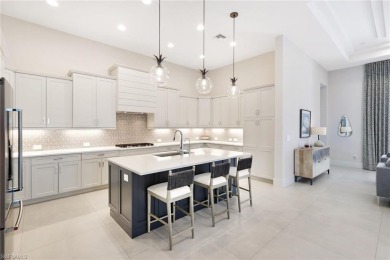 Discover this Beautiful Modern Elegant home in the exclusive on The Golf Club At Fiddlers Creek in Florida - for sale on GolfHomes.com, golf home, golf lot