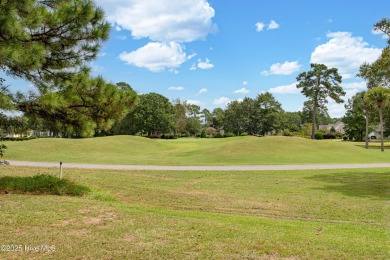 Build your dream home on this prime homesite in a premier golf on Brunswick Plantation and Golf Resorts in North Carolina - for sale on GolfHomes.com, golf home, golf lot
