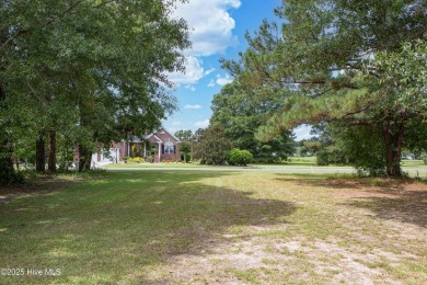 Build your dream home on this prime homesite in a premier golf on Brunswick Plantation and Golf Resorts in North Carolina - for sale on GolfHomes.com, golf home, golf lot