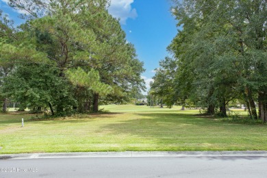 Build your dream home on this prime homesite in a premier golf on Brunswick Plantation and Golf Resorts in North Carolina - for sale on GolfHomes.com, golf home, golf lot