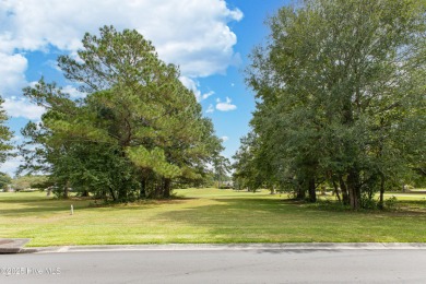 Build your dream home on this prime homesite in a premier golf on Brunswick Plantation and Golf Resorts in North Carolina - for sale on GolfHomes.com, golf home, golf lot